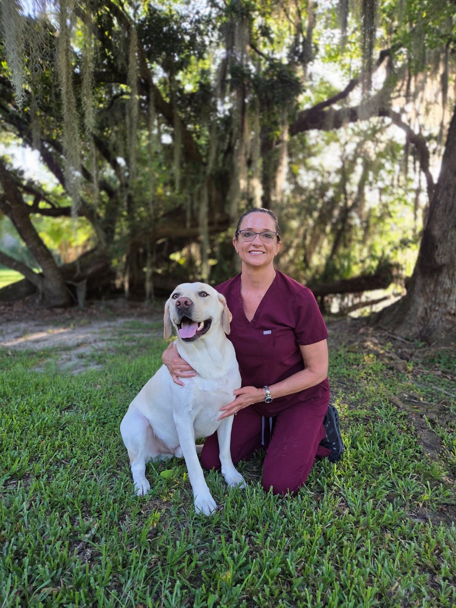 Dr. Kara Eilts with Tank — veterinarian at Southern Pearl Veterinary Hospital